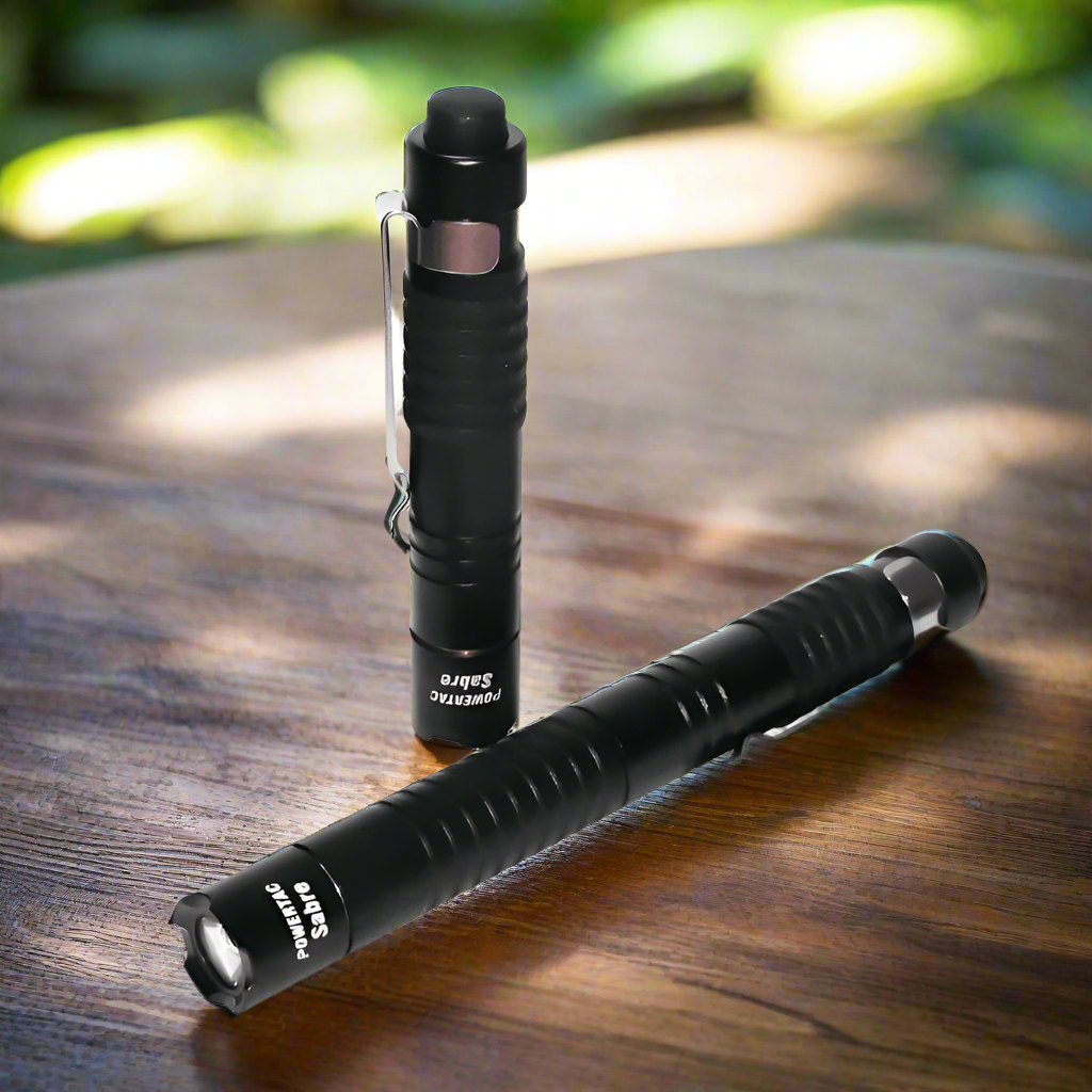 Black aluminum Powertac AAA penlight flashlight with 239 lumens and a compact design, featuring CREE XP-G2 LED.