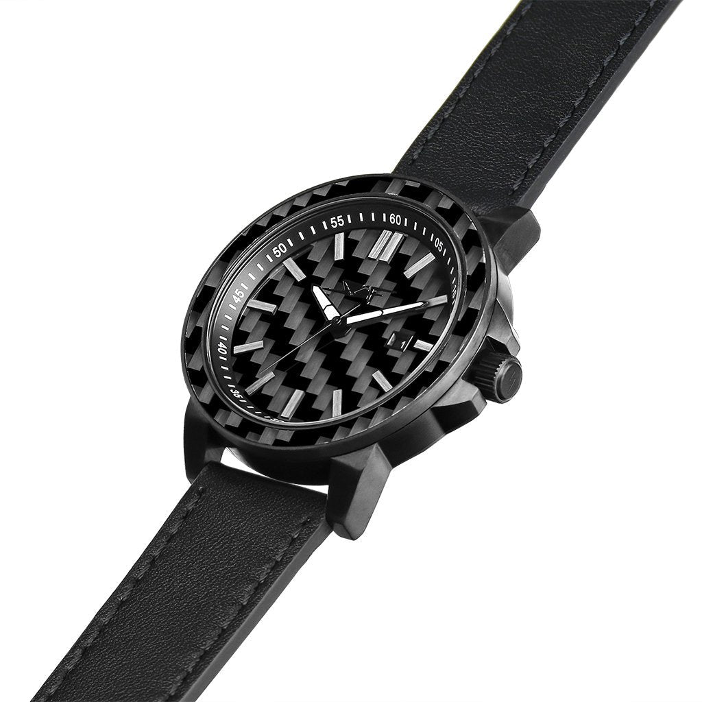 Black carbon fiber watch with textured dial and black leather strap from Simply Carbon Fiber.